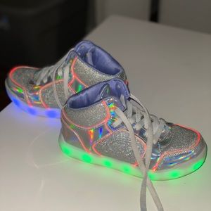 Kids size 12.5 Skechers light up shoes.